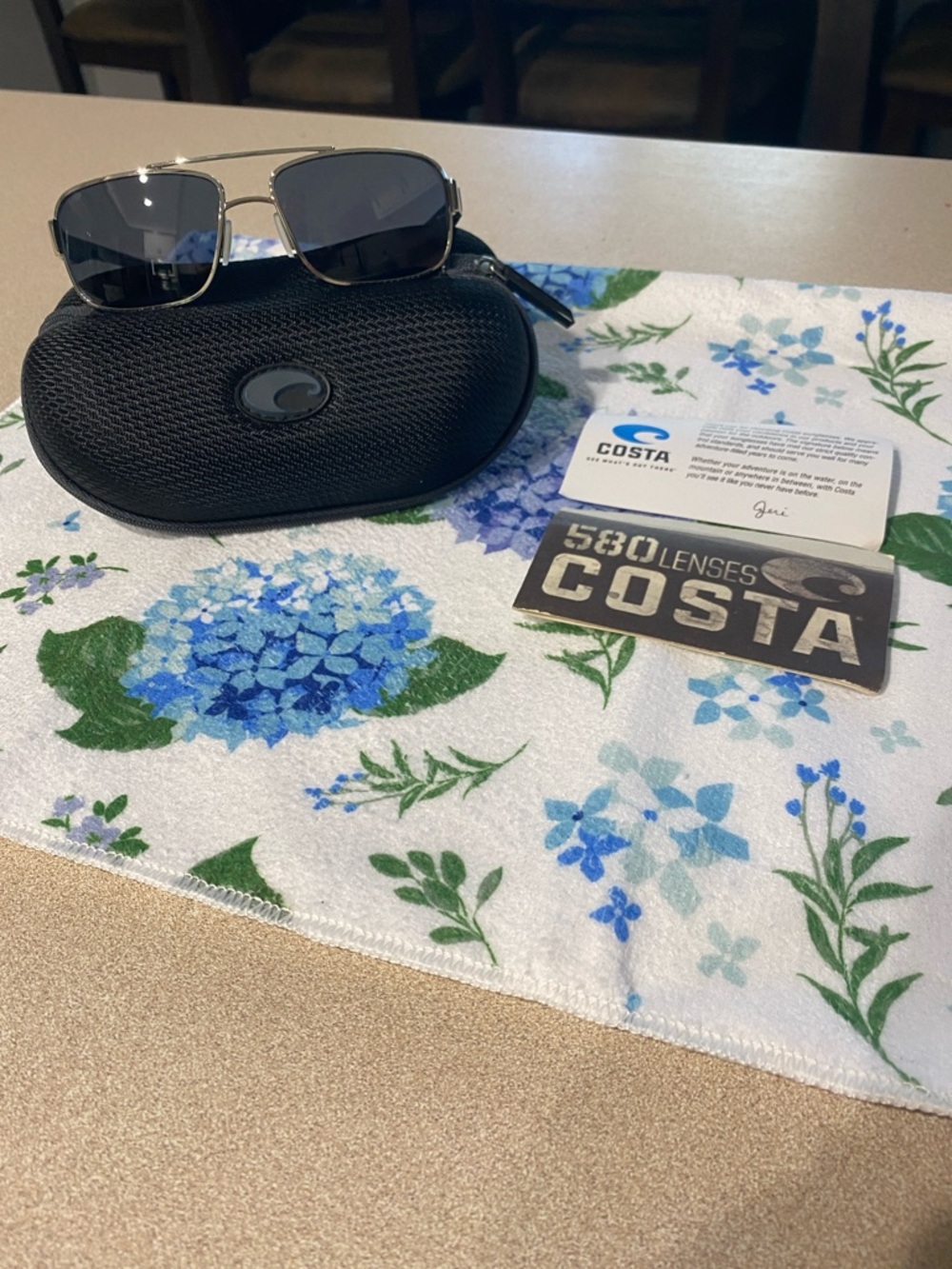 Costa Silver Frame Sunglasses with Dark Gray Lenses
